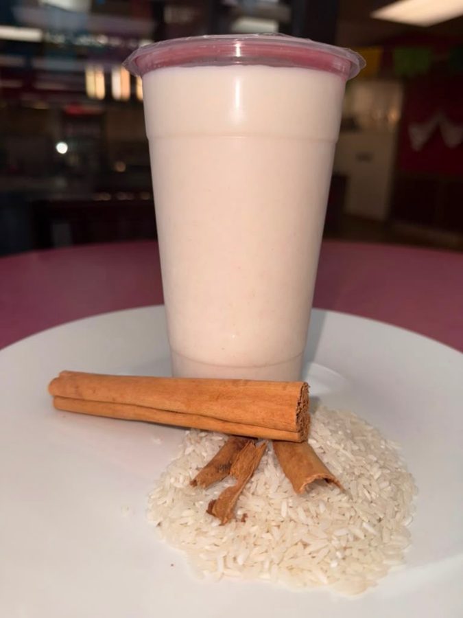 Homemade horchata with cinnamon sticks and rice